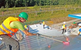 Bonding agent applied and the waterproof sheets installed. Waterproof sheets are installed